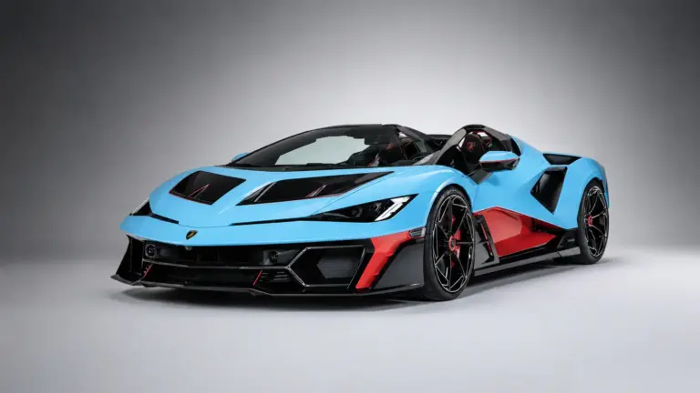Niebieskie Lamborghini Fenomeno Roadster widok z przodu, agresywne wloty powietrza i karbonowe detale.