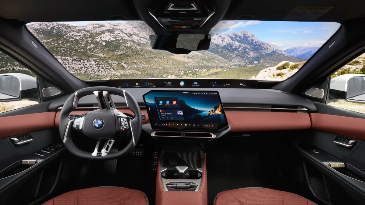 Wnętrze BMW i3 50 xDrive z systemem Panoramic iDrive i ekranem centralnym. Nowe BMW i3.