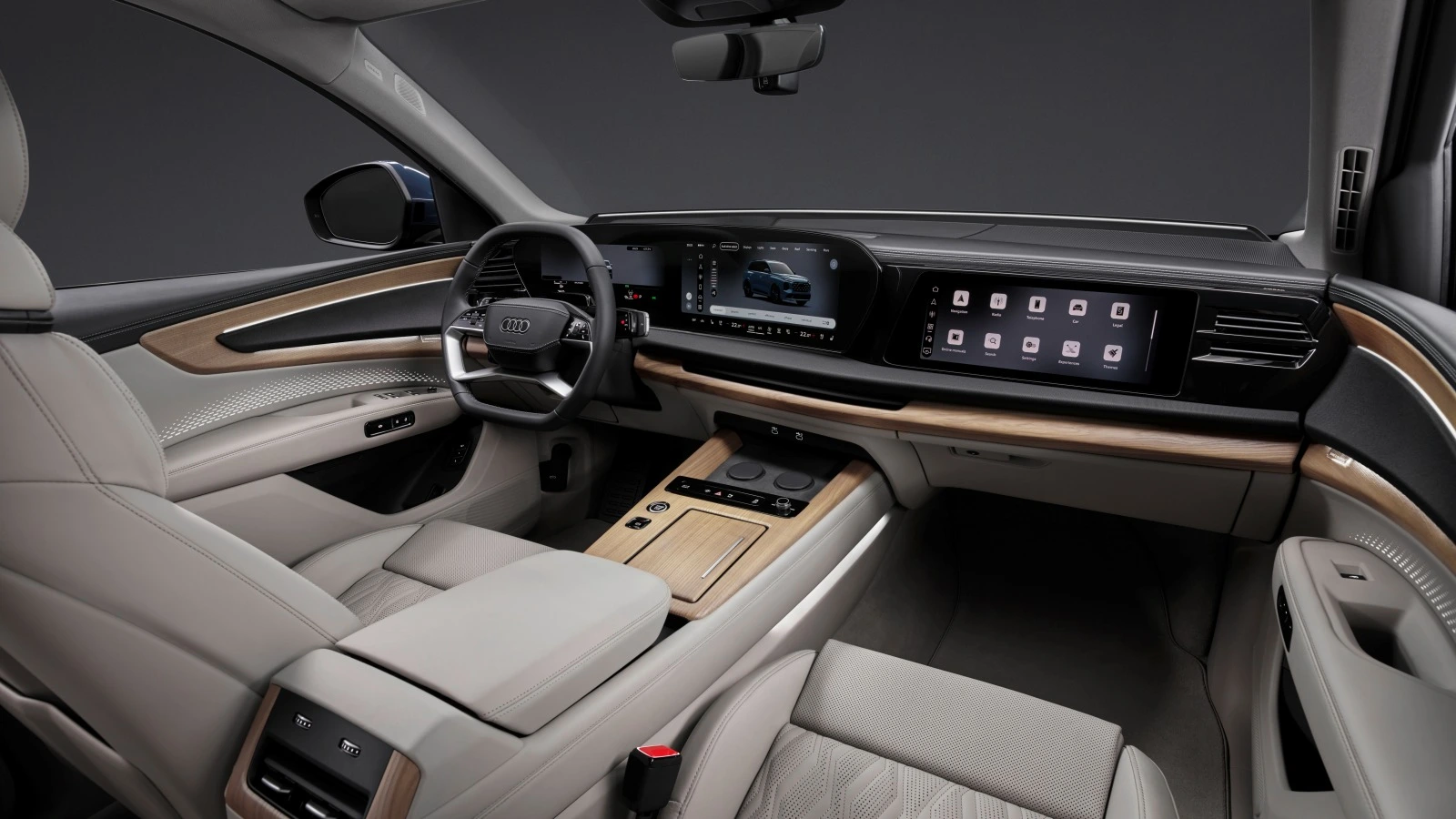Kokpit nowego Audi Q7 2026 z ekranami MMI i ekranem pasażera