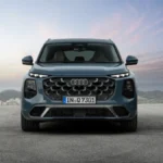 Nowe Audi Q7 2026 widziane z przodu z osłoną Singleframe i cyfrowymi światłami
