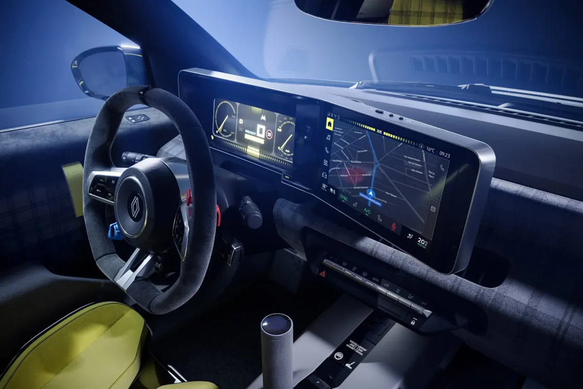 Kokpit Renault 5 Turbo 3E z cyfrowymi zegarami, ekranem multimedialnym i sportową kierownicą