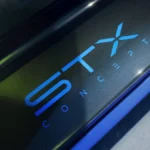 Opel STX Concept. Napis STX Concept na detalu nadwozia zapowiadanego samochodu koncepcyjnego Opla.
