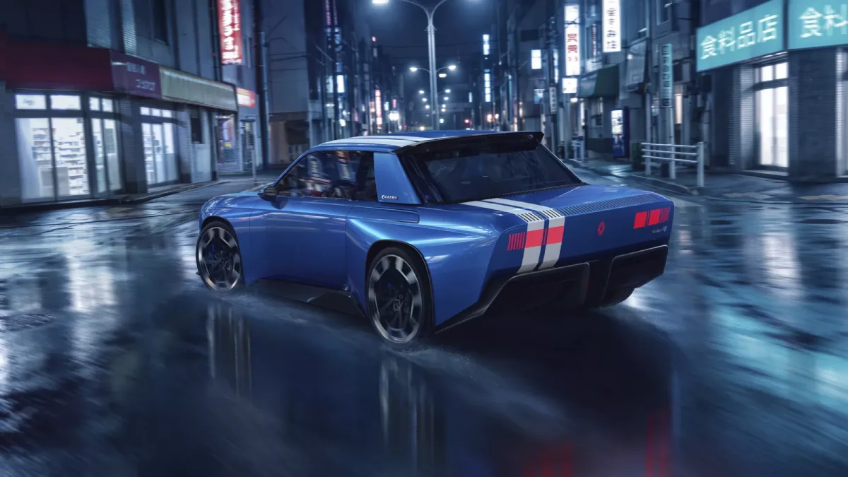 Tył niebieskiego Renault 8 Gordini Concept z białymi pasami i czerwonymi światłami
