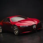 Alfa Romeo Cuorerosso w ujęciu z przodu i boku, czerwone sportowe coupé ze złotymi felgami i trójkątnym grillem Scudetto