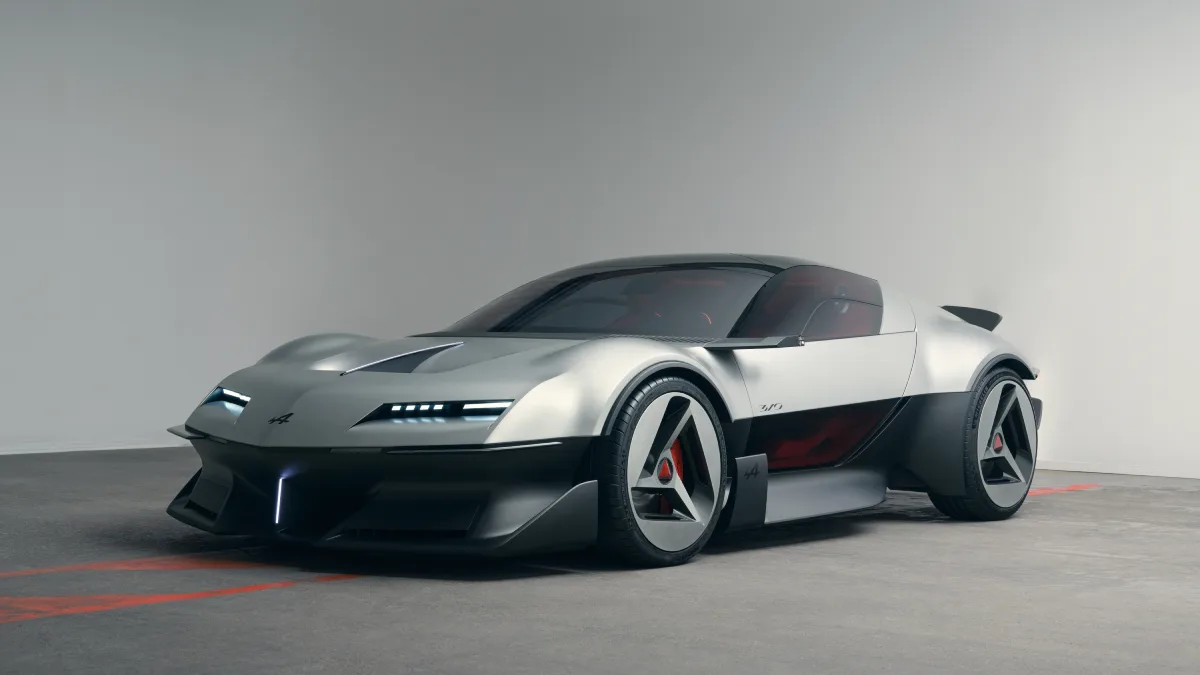Srebrne Alpine A310 Vision od przodu i boku, z niskim nadwoziem i dużymi trójramiennymi kołami