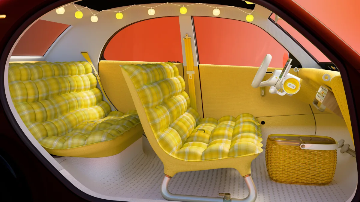 Wnętrze Citroëna 2 CV Concept z żółtymi fotelami w kratkę, białą kierownicą i jasnym wykończeniem