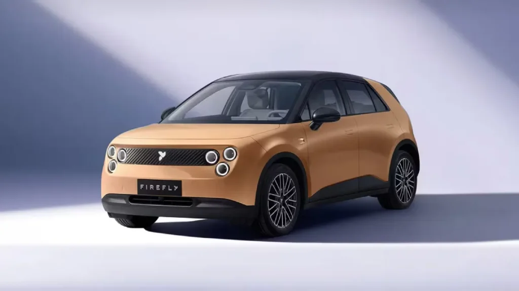 Pomarańczowy Nio Firefly, elektryczny hatchback, widok z przodu i boku