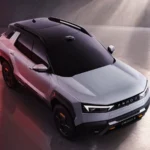 OMODA X 2026, srebrny koncepcyjny SUV z czarnym dachem, widziany z przodu i z góry