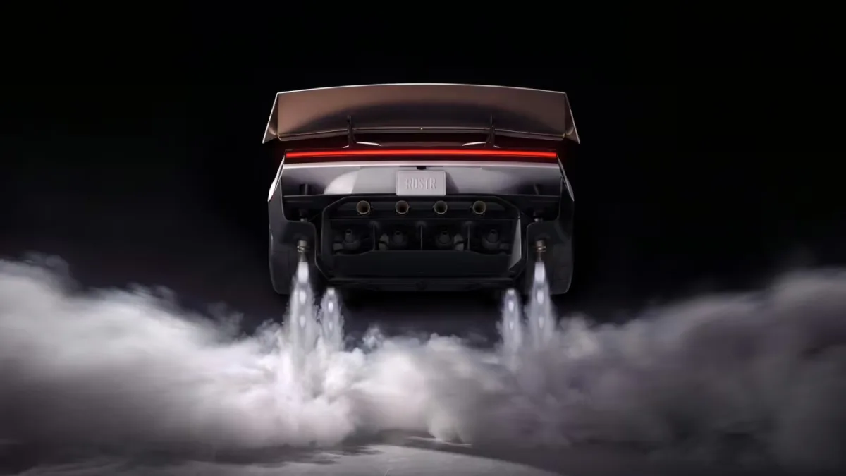 Tesla Roadster 2026 widziana od tyłu, z dużym skrzydłem, czerwonym pasem świetlnym i graficzną wizualizacją strumieni pod samochodem